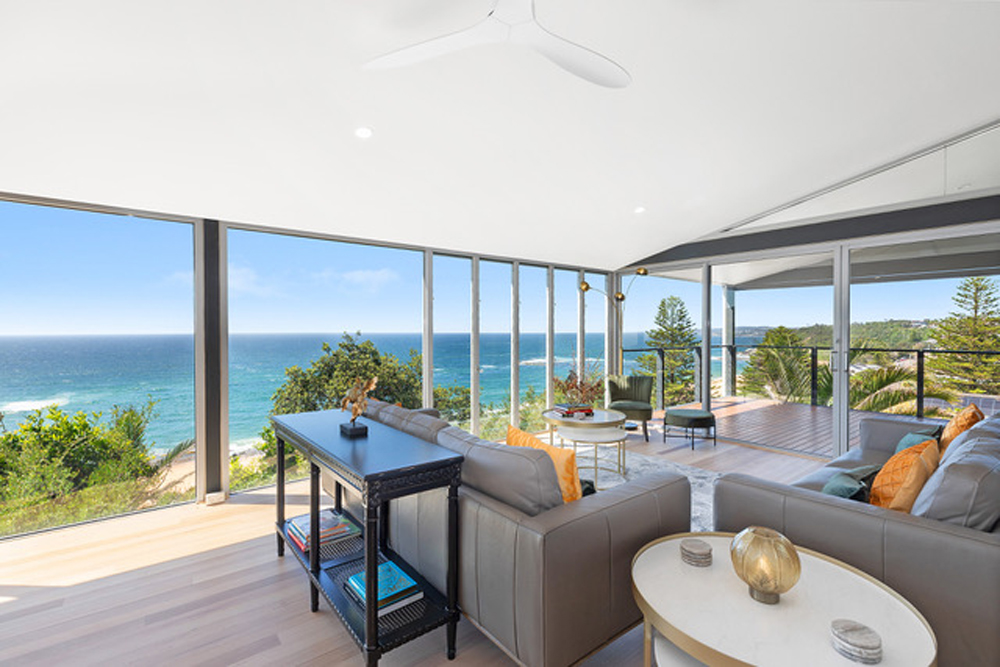 living-area-sandcastle-forresters-beach-luxury-holiday-home-coasthosting