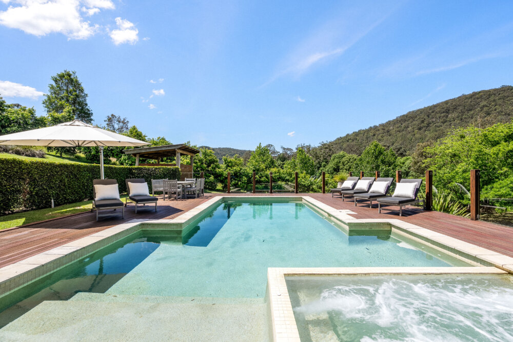 Serene, a luxury 4-bed waterfront home in Point Clare with pool, spa, boat ramp & stunning views. Sleeps 10. The ultimate Central Coast escape. Book now!