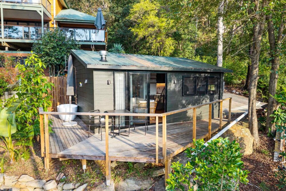 Serene, a luxury 4-bed waterfront home in Point Clare with pool, spa, boat ramp & stunning views. Sleeps 10. The ultimate Central Coast escape. Book now!