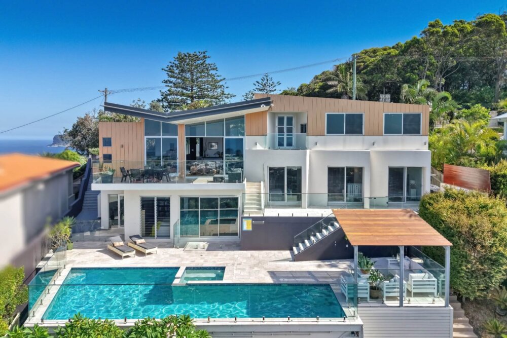 Serene, a luxury 4-bed waterfront home in Point Clare with pool, spa, boat ramp & stunning views. Sleeps 10. The ultimate Central Coast escape. Book now!