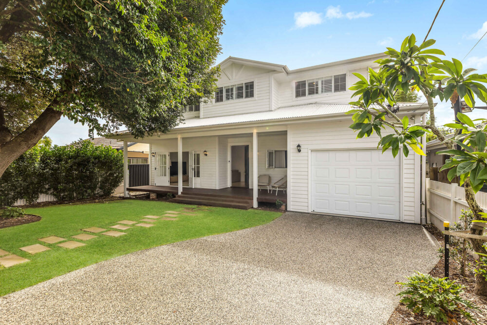 Soaring ceilings. French doors. A fire pit in the garden. Steps to the beach. Welcome to The Oasis. The Oasis is a beautifully renovated coastal manor in the heart of Umina Beach — five bedrooms for twelve guests, a designer kitchen, a fire pit in the landscaped backyard, and the golden sands of Umina Beach a short stroll from the front door. For large families who want architectural character, genuine luxury, and an extraordinary base on the Central Coast, this is it.